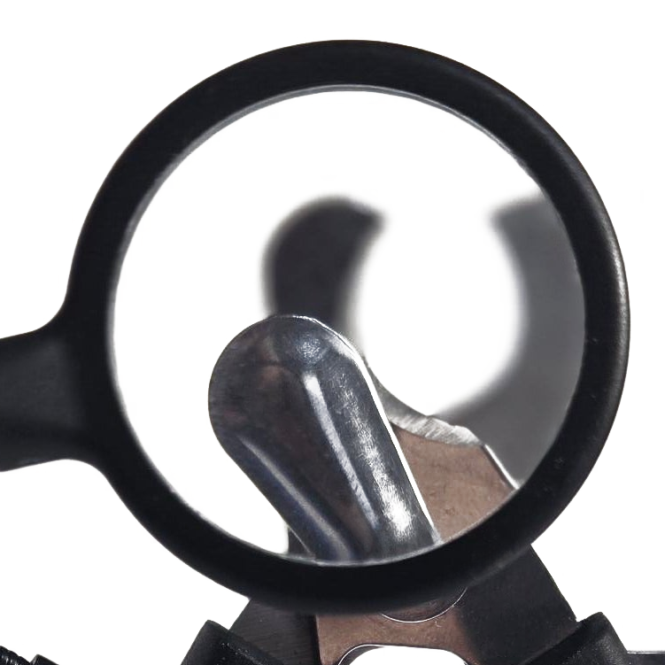 Close-up of Zakity dog nail clipper magnifier lens 