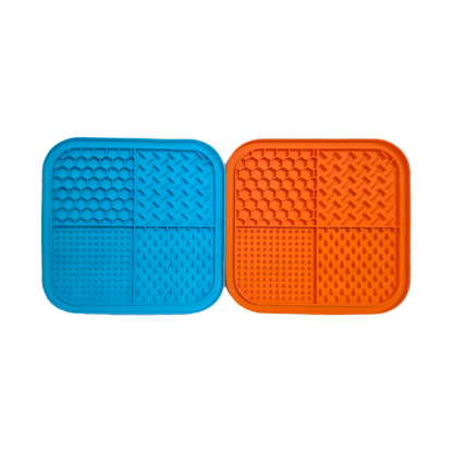 Zakity lick mat 2-pack showing blue and orange silicone mats with different textured surfaces for spreading treats