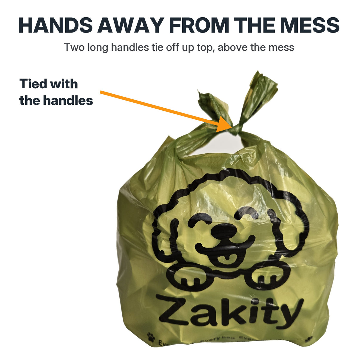 Green Zakity poop bag tied closed with its two long handles, labeled Hands away from the mess